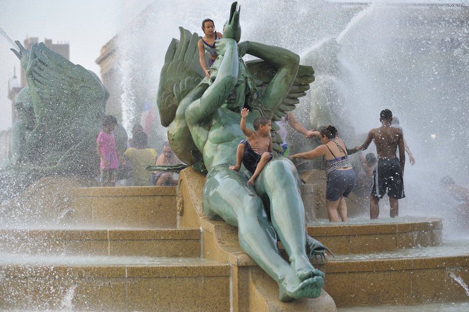 Children cooling off in Swann Fountain.